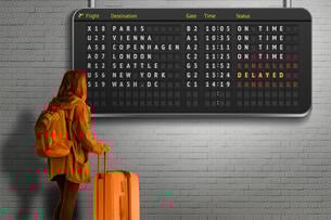 A student looking at a travel flight board with options to U.S. cities listed as "canceled" and flights to European cities as "on time."