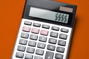 A calculator displaying "$$$$" in the answer field.