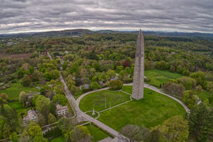 An aerial photo of the Bennington Battle Monument, a 306-foot obelisk.