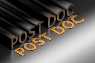 An illustration featuring the word "Post Doc," variously written in orange and charcoal grey shadow-like font, against a black/gray background.