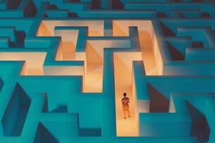 An illustration of a woman standing at the start of an illuminated pathway within a dark maze.