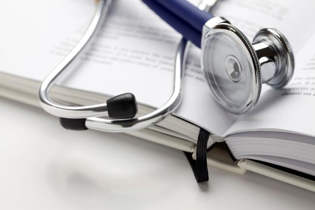 stethoscope on books 