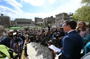 House Speaker Mike Johnson and crowd at Columbia