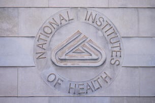 National Institutes of Health logo on building