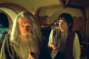 Ian McKellen as Gandalf and Elijah Wood as Frodo in an on-set shot from the first Lord of the Rings movie