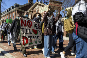 Protesters outside Harvard rally against the Trump administration.