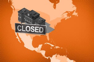 A map of the United States with a school building on it that has a closed sign hanging off it.