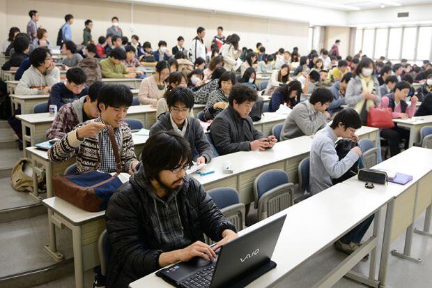 Students in rows of desk at Kyoto University