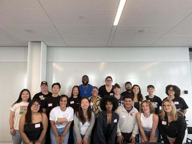 Students pose for a group photos at the Newbury Center at Boston University.
