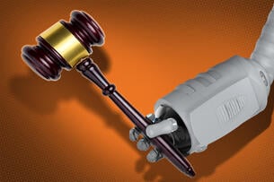 A robot arm holding a gavel.