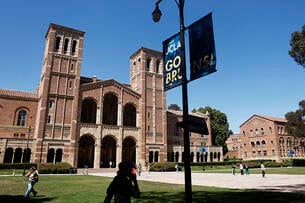 People walk on the plaza outside Royce Hall, the site of 2024 pro-Palestinian protests, on the UCLA campus.