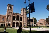 People walk on the plaza outside Royce Hall, the site of 2024 pro-Palestinian protests, on the UCLA campus.