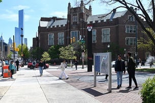 Students walk across the University of Pennsylvania campus.